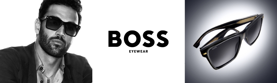 Ein Mann trägt eine schwarze BOSS Sonnenbrille.
